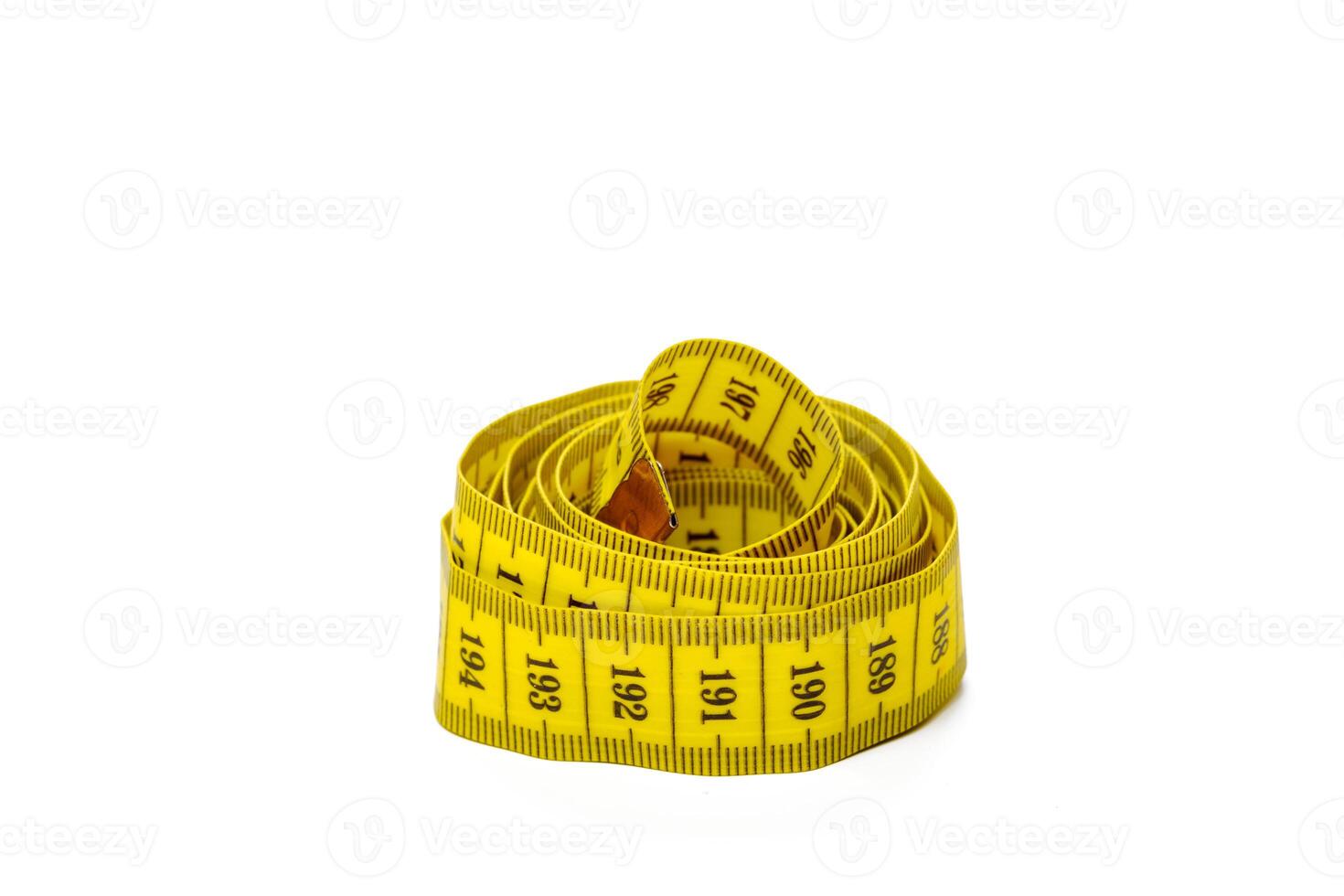 yellow metric measuring tape isolated on white panorama background photo