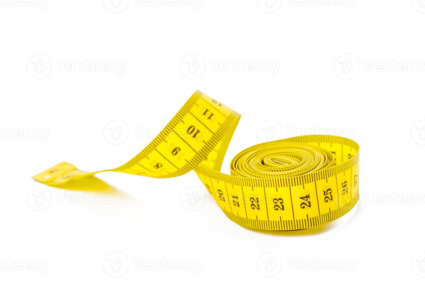 yellow metric measuring tape isolated on white panorama background photo