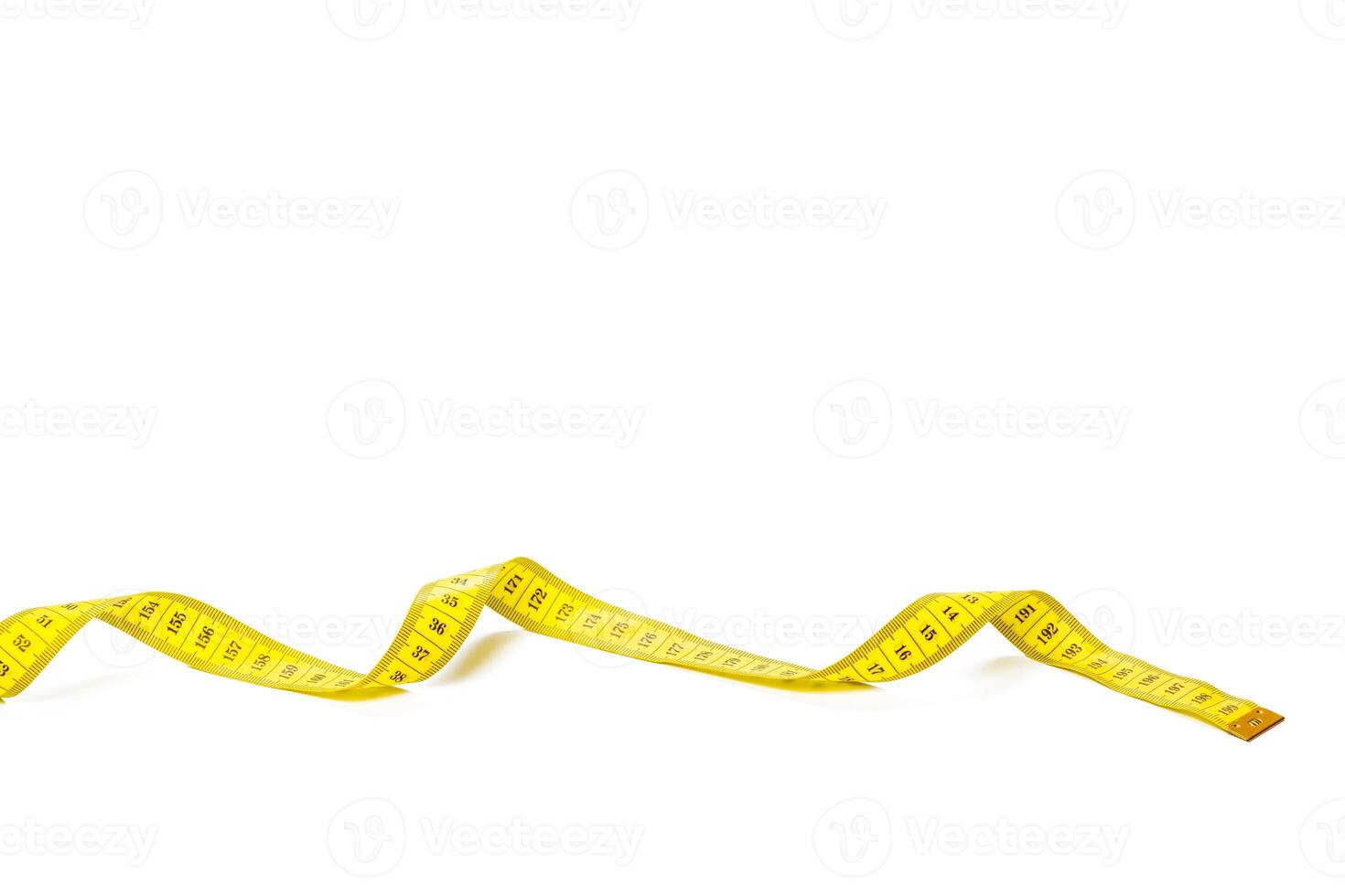 yellow metric measuring tape isolated on white panorama background photo