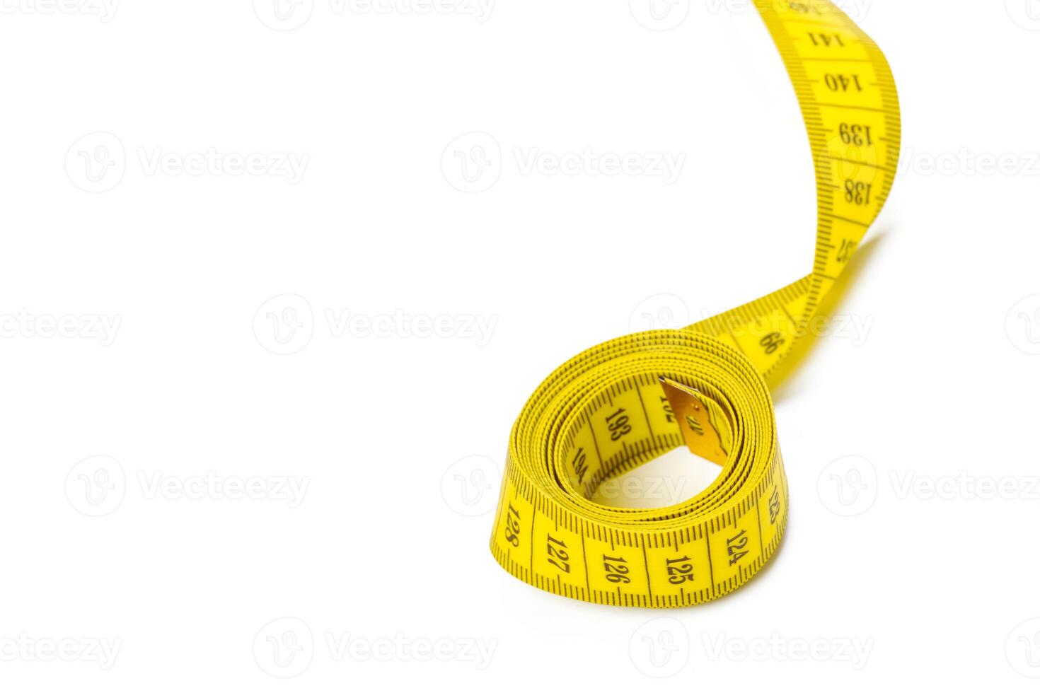 yellow metric measuring tape isolated on white panorama background photo