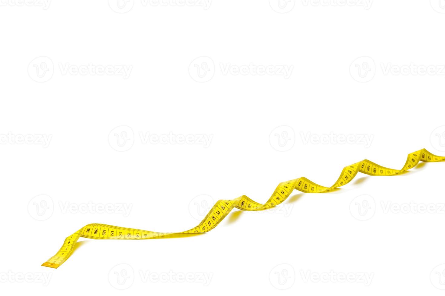 yellow metric measuring tape isolated on white panorama background photo