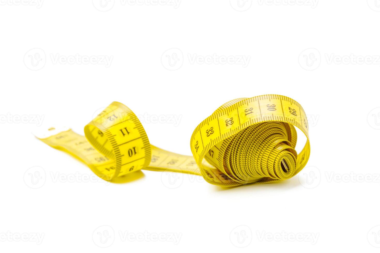 yellow metric measuring tape isolated on white panorama background photo