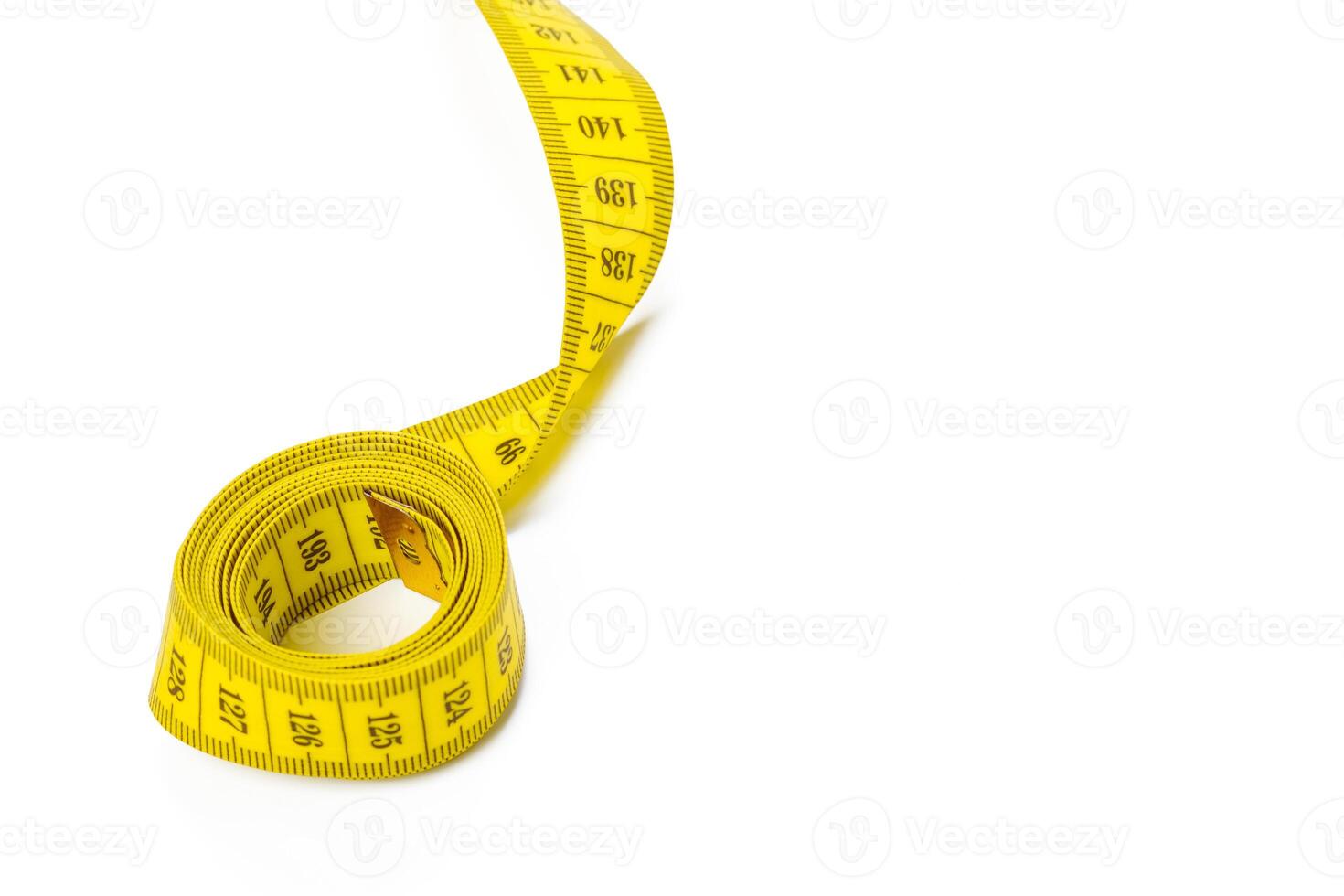 yellow metric measuring tape isolated on white panorama background photo