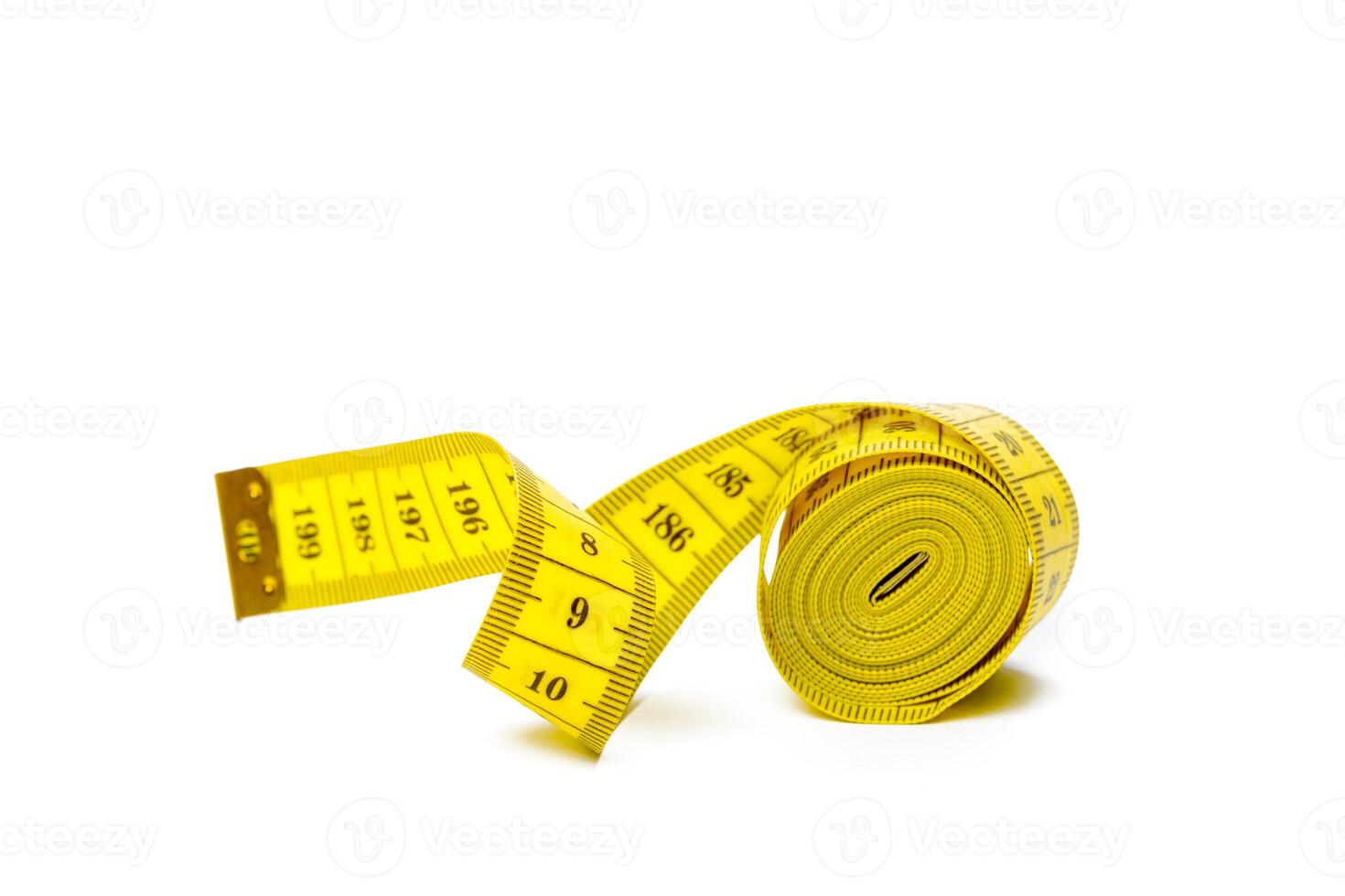 yellow metric measuring tape isolated on white panorama background photo