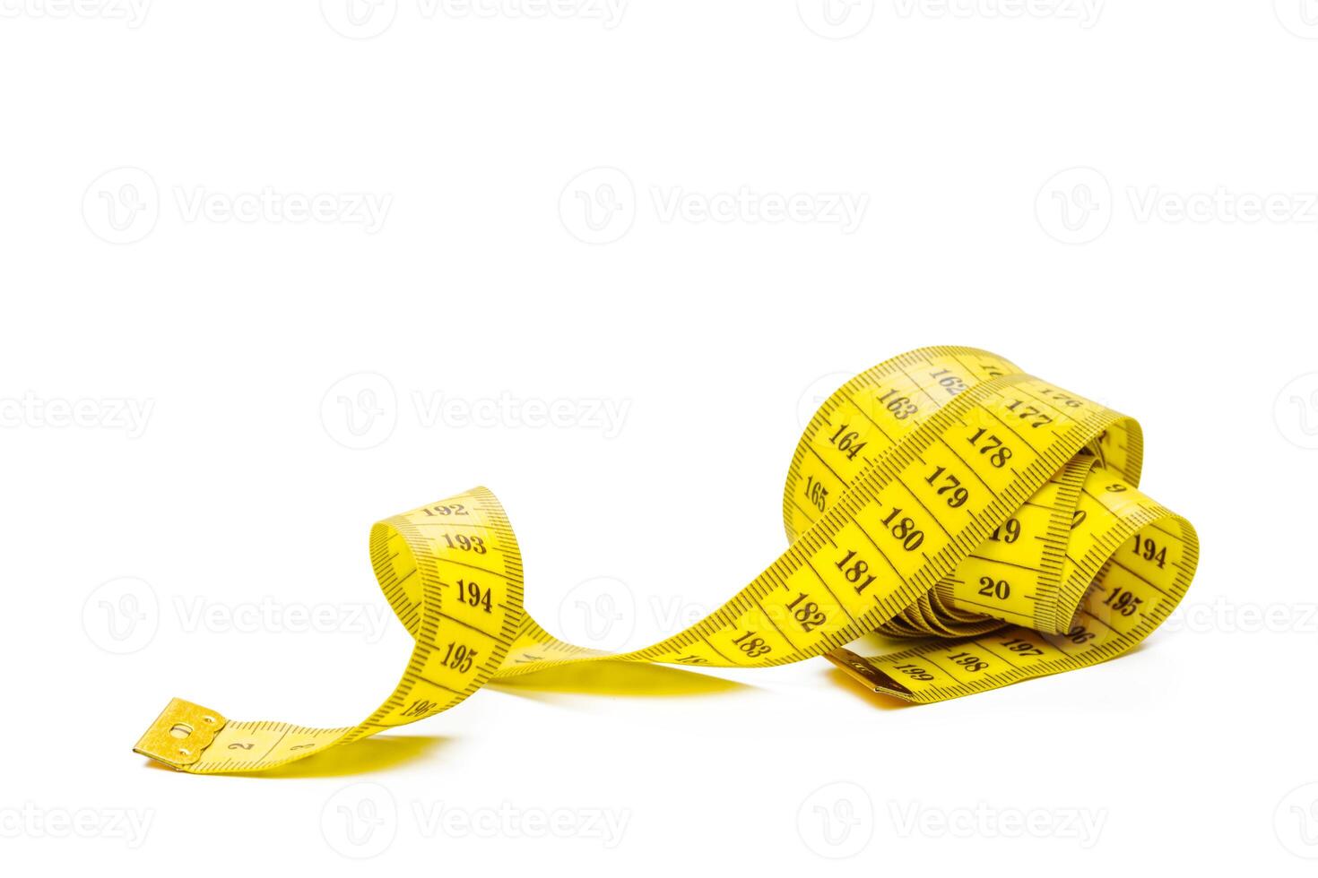 yellow metric measuring tape isolated on white panorama background photo