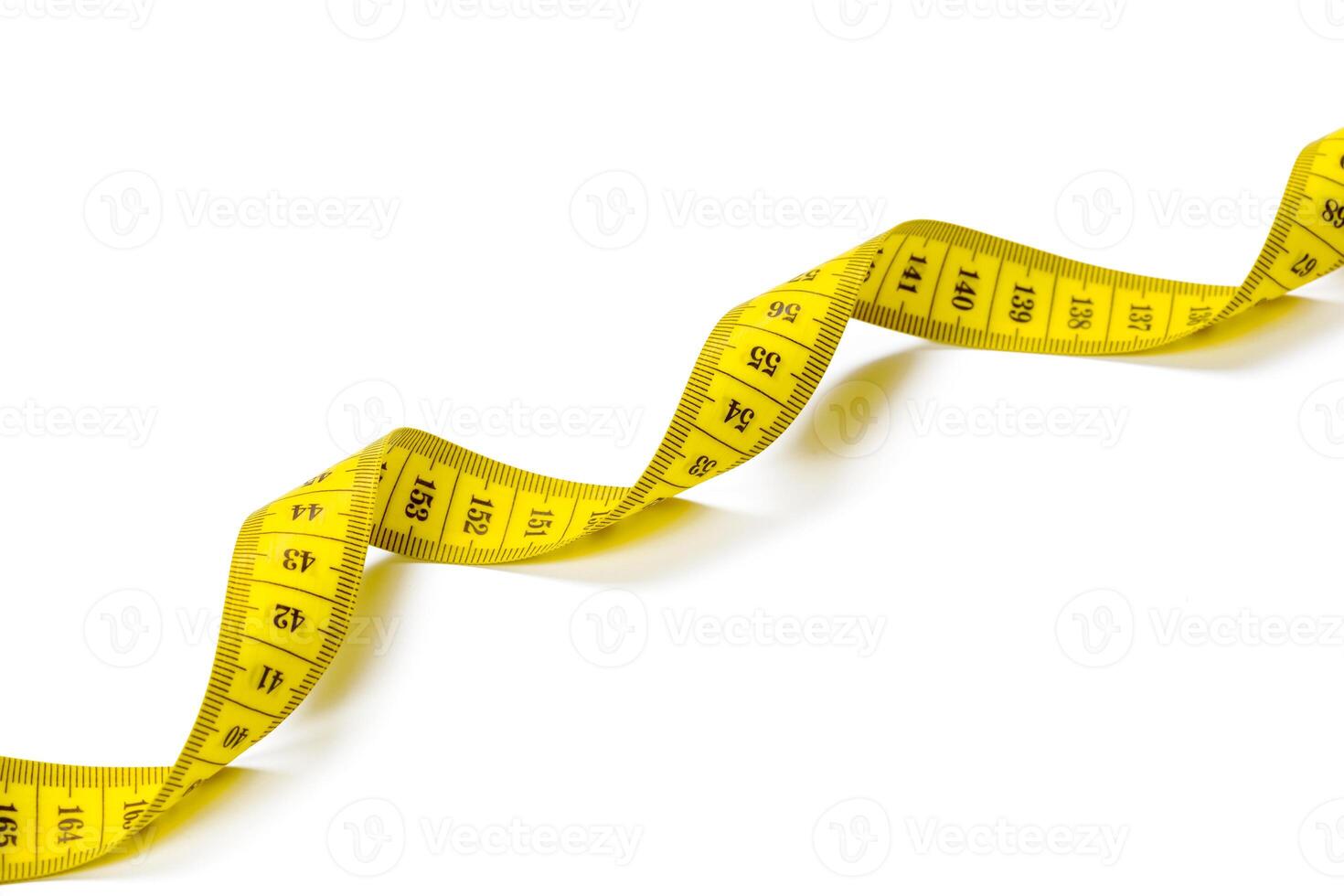 yellow metric measuring tape isolated on white panorama background photo
