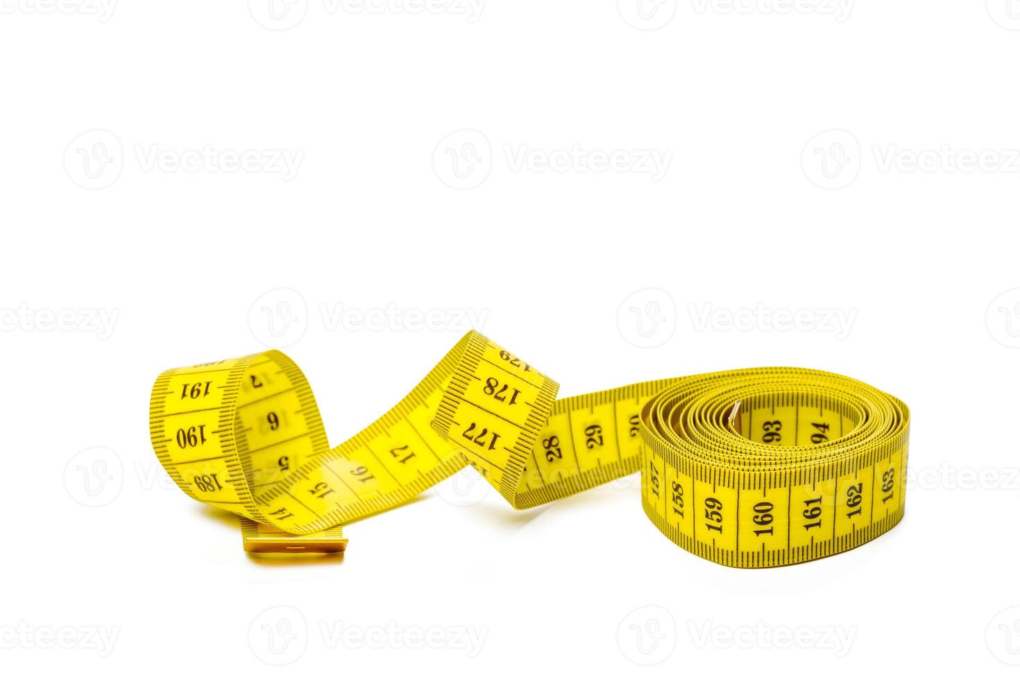 yellow metric measuring tape isolated on white panorama background photo