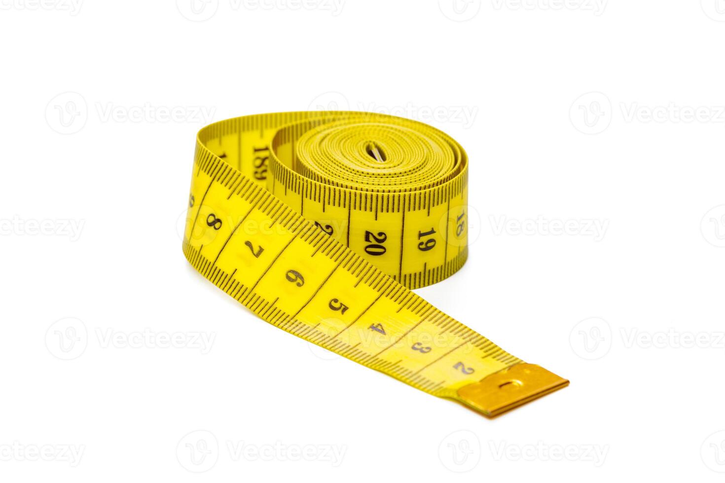 yellow metric measuring tape isolated on white panorama background photo