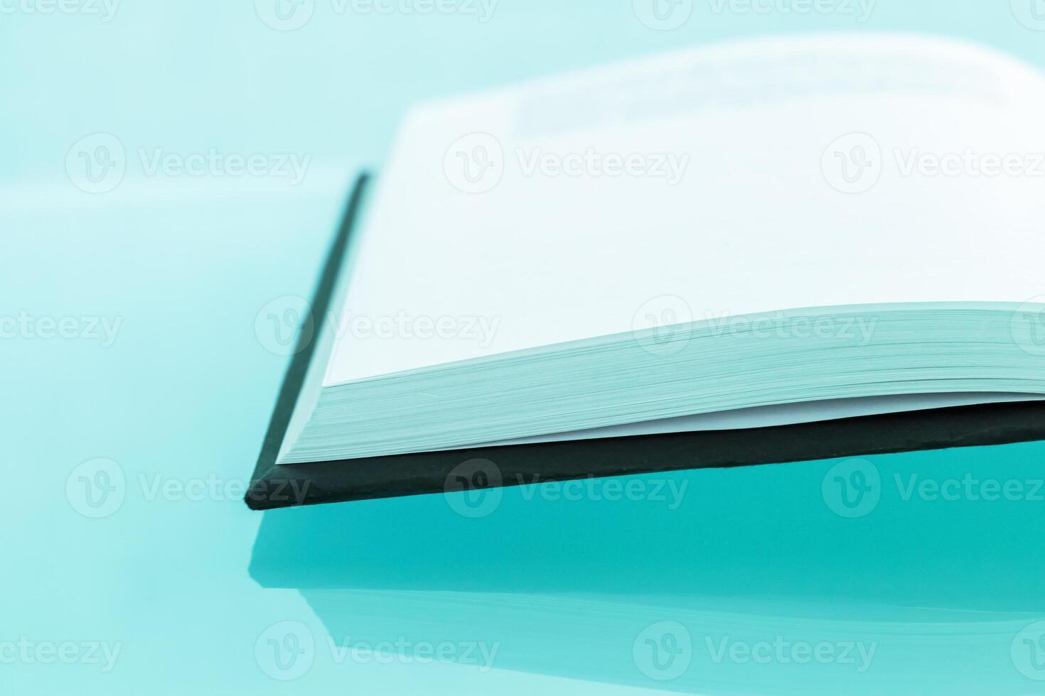 Blank notebook on the table photo