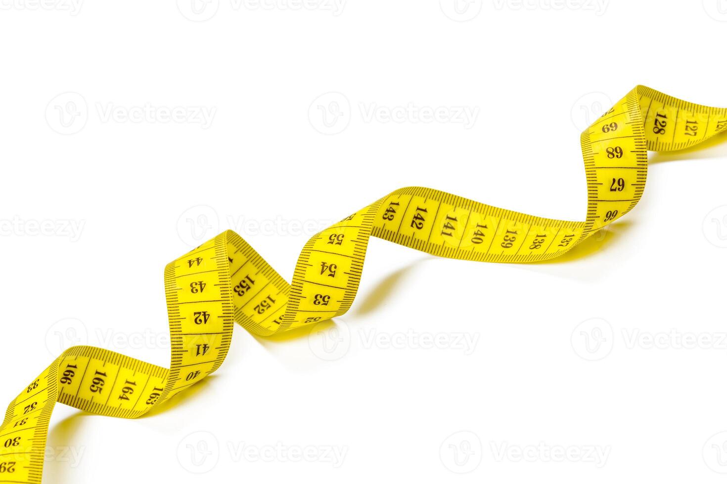 yellow metric measuring tape isolated on white panorama background photo