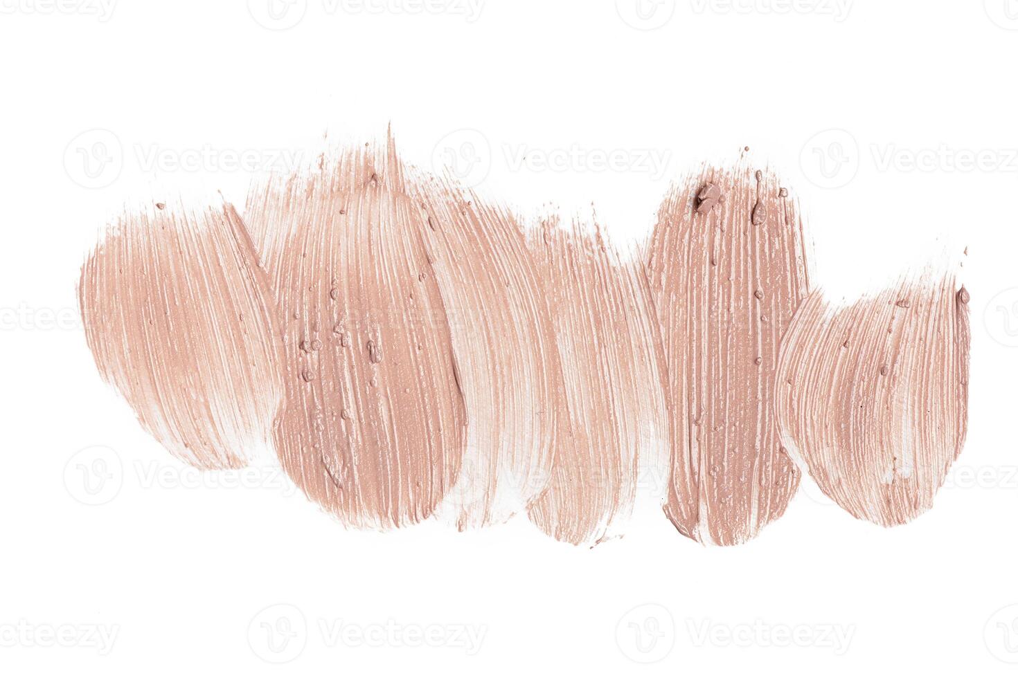 smeared foundation natural make up on white background photo