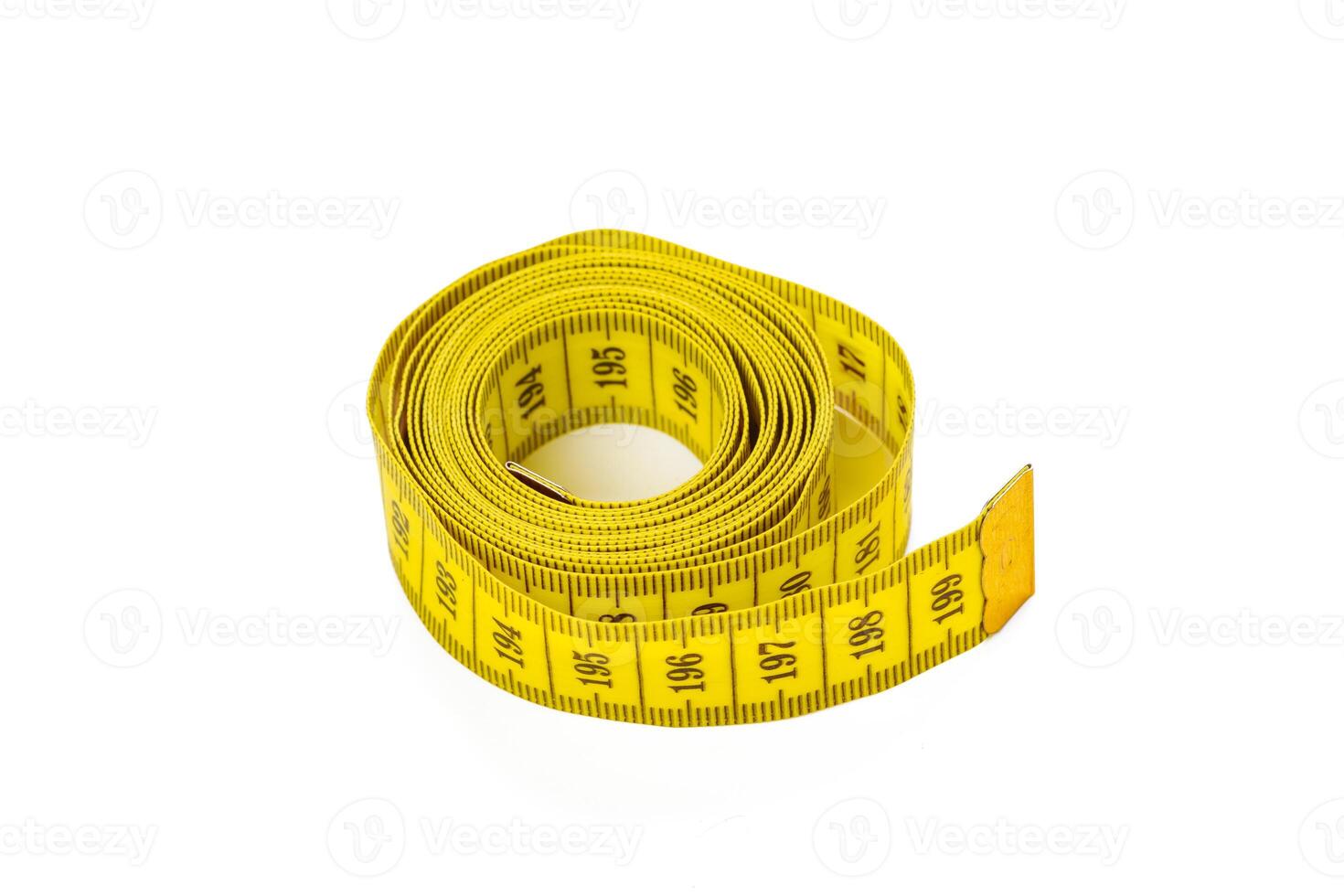 yellow metric measuring tape isolated on white panorama background photo