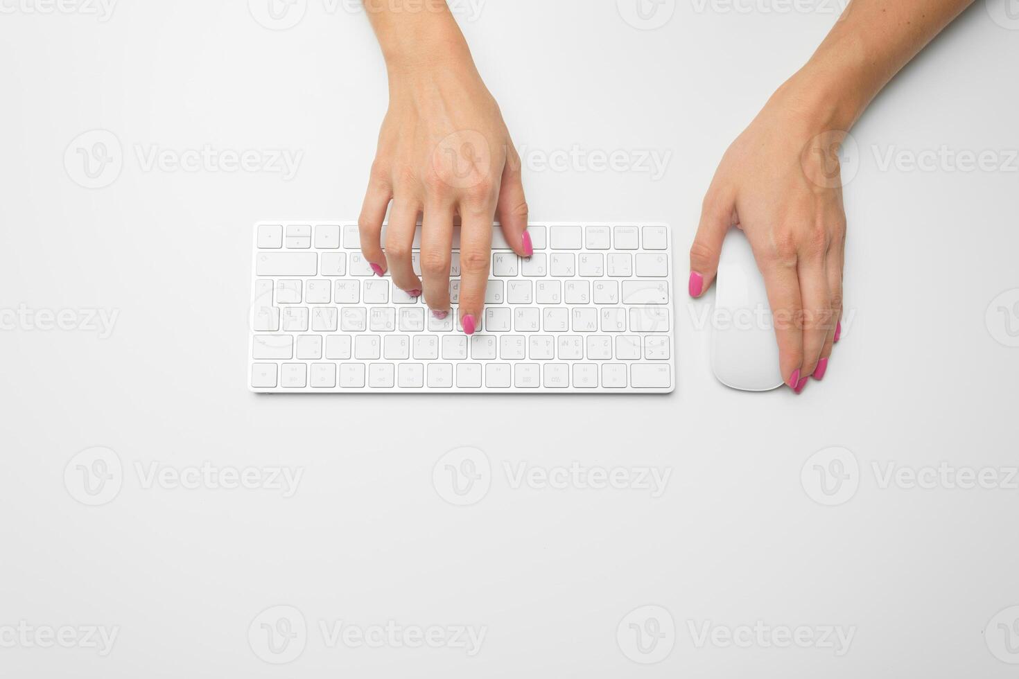 Woman's hands on a keyboard photo