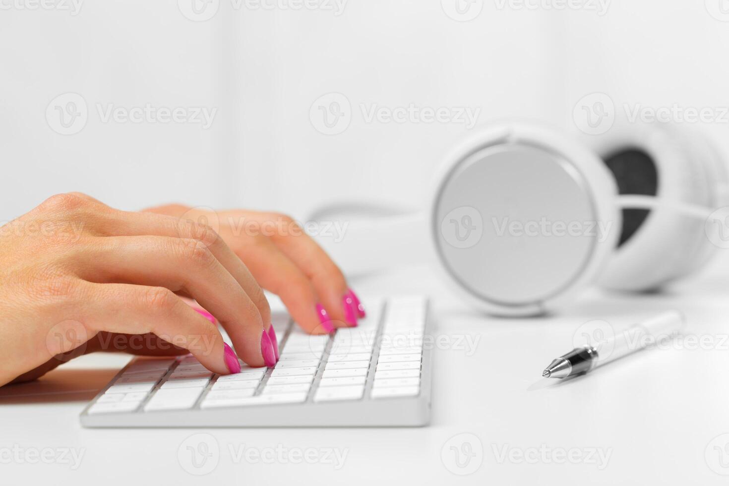 Woman's hands on a keyboard photo
