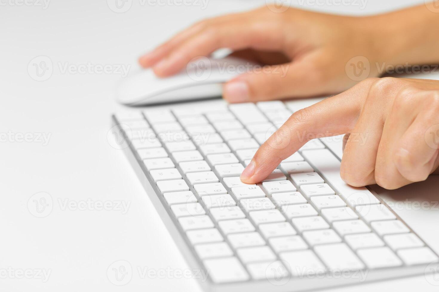 Woman's hands on a keyboard photo
