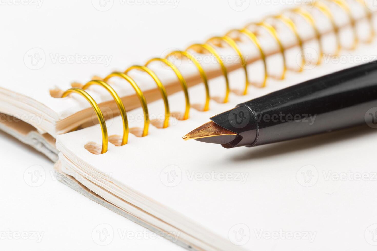 Pen and notebook photo
