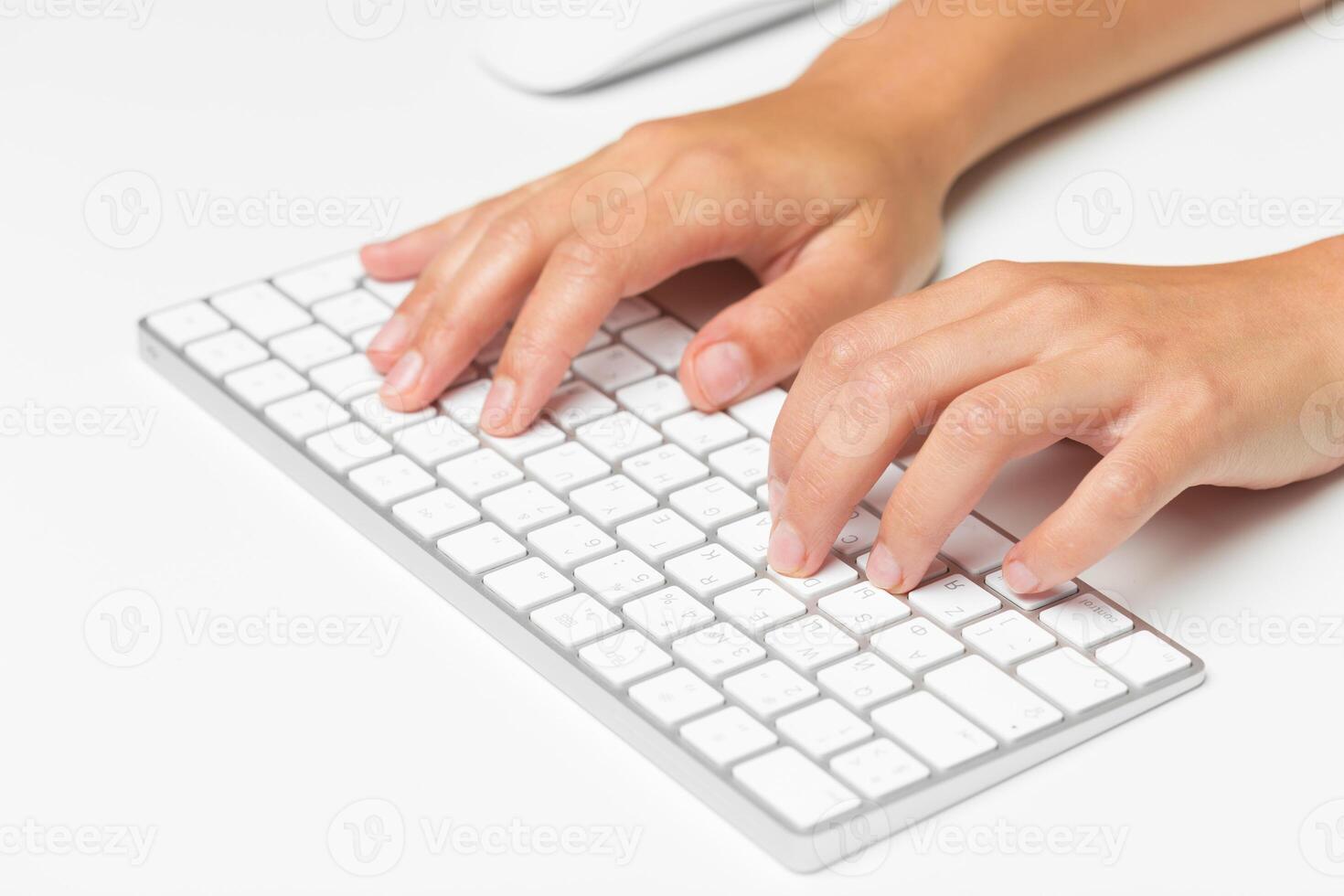Woman's hands on a keyboard photo