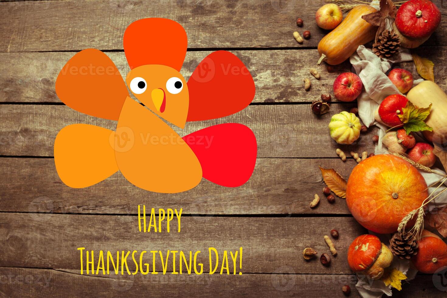 Happy thanksgiving day display on wooden background photo