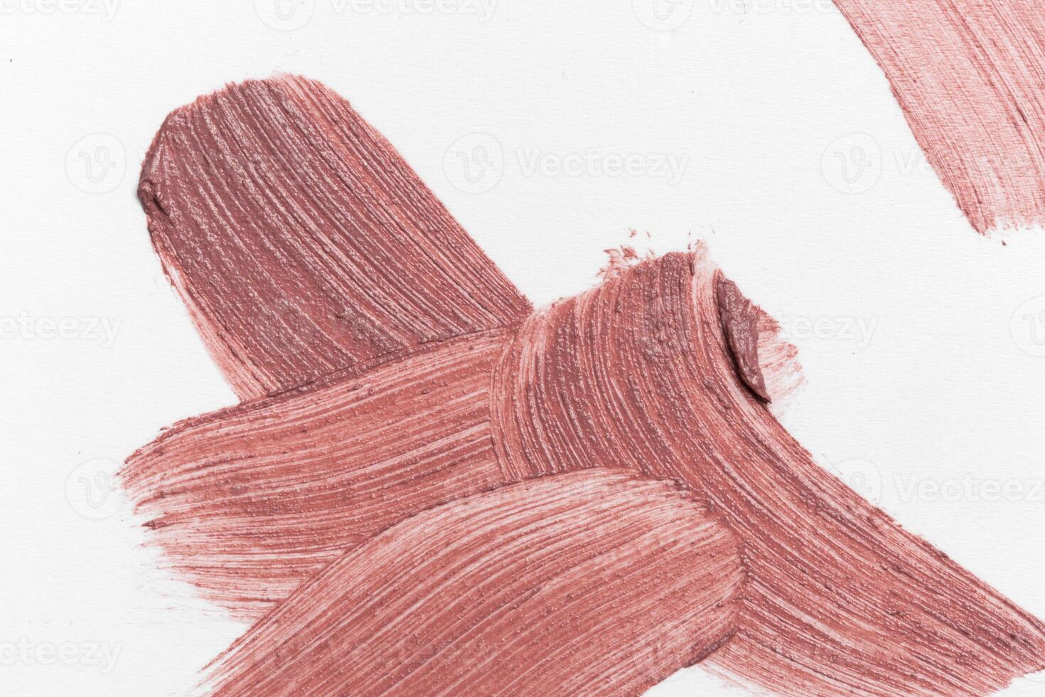 smeared foundation natural make up on white background photo