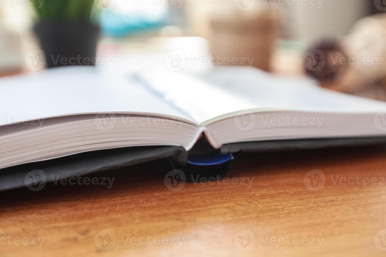 Blank notebook on the table photo