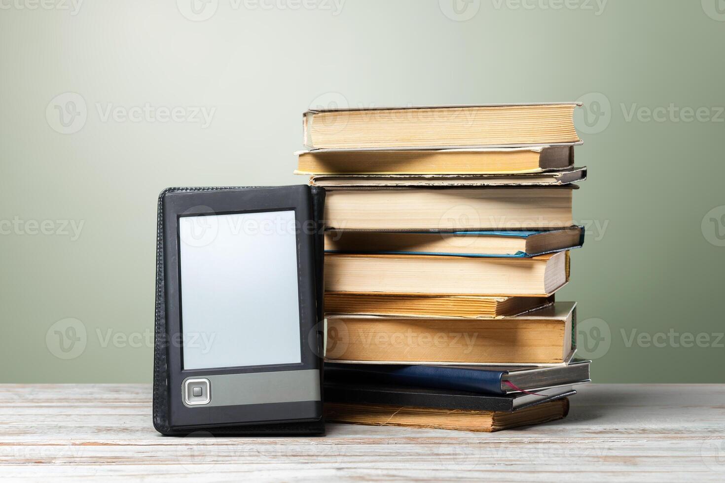 Stacked books on a table photo