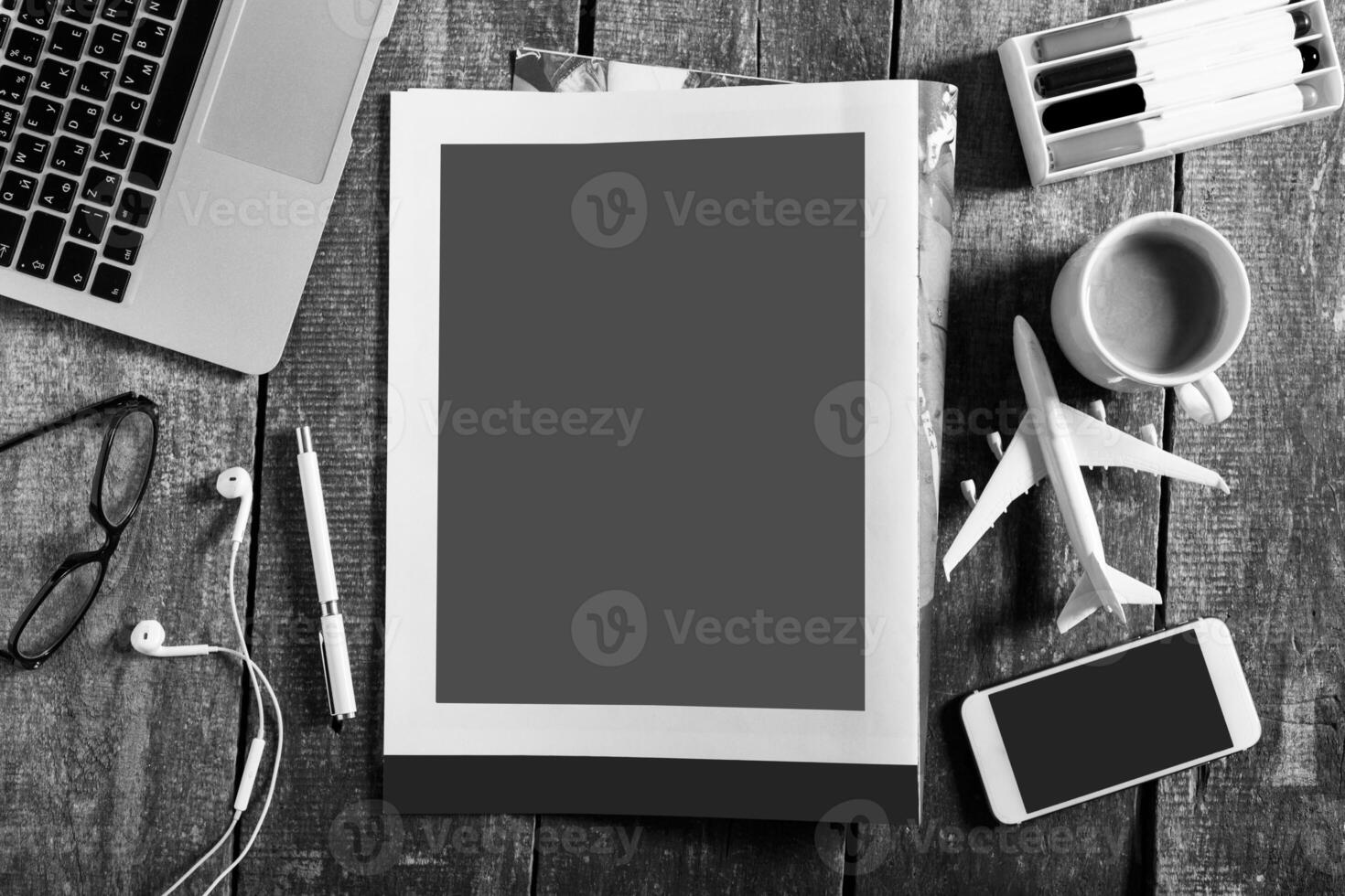 Blank open book, brochure or magazine on vintage wooden table background photo