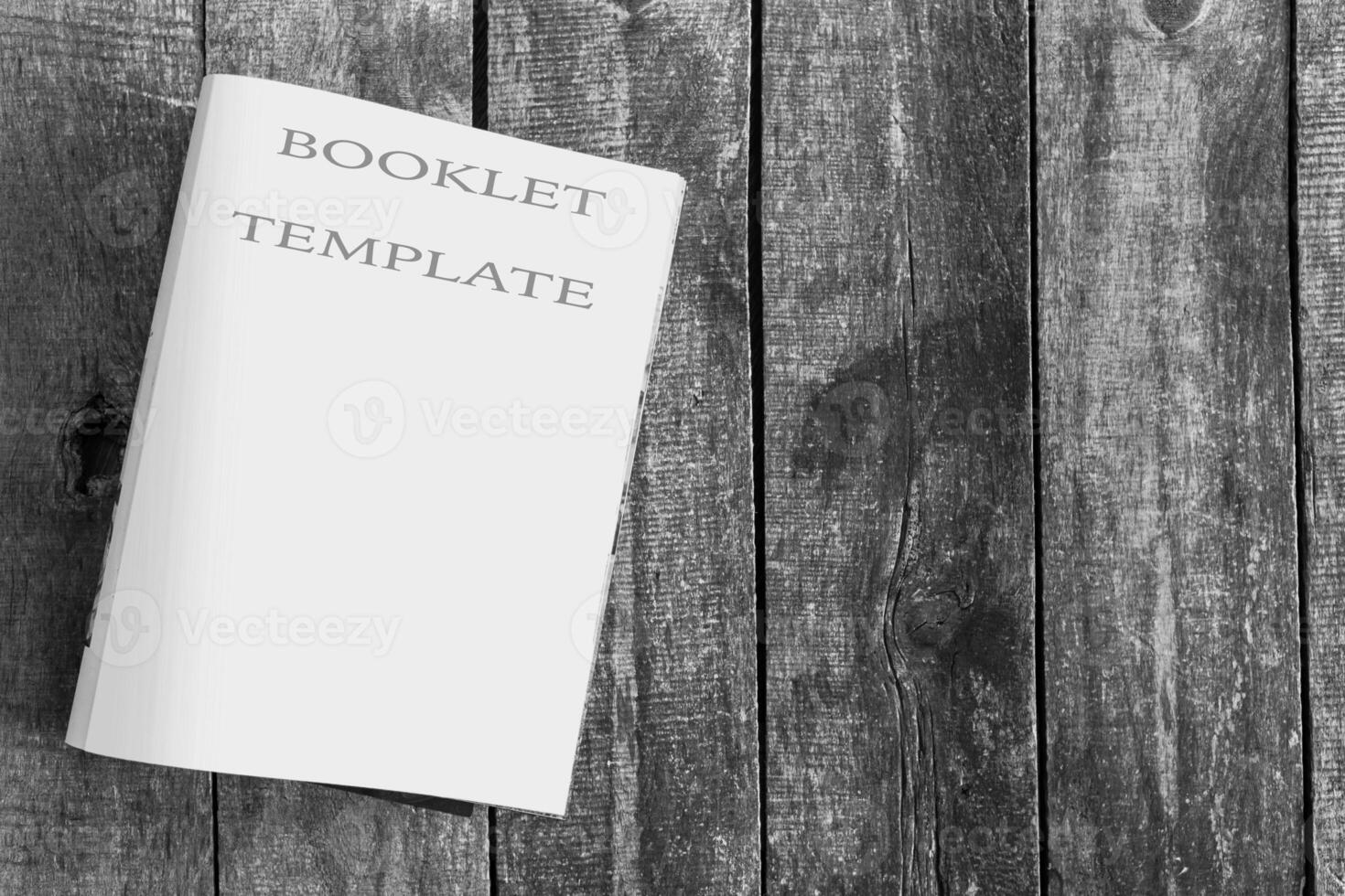 Blank open book, brochure or magazine on vintage wooden table background photo