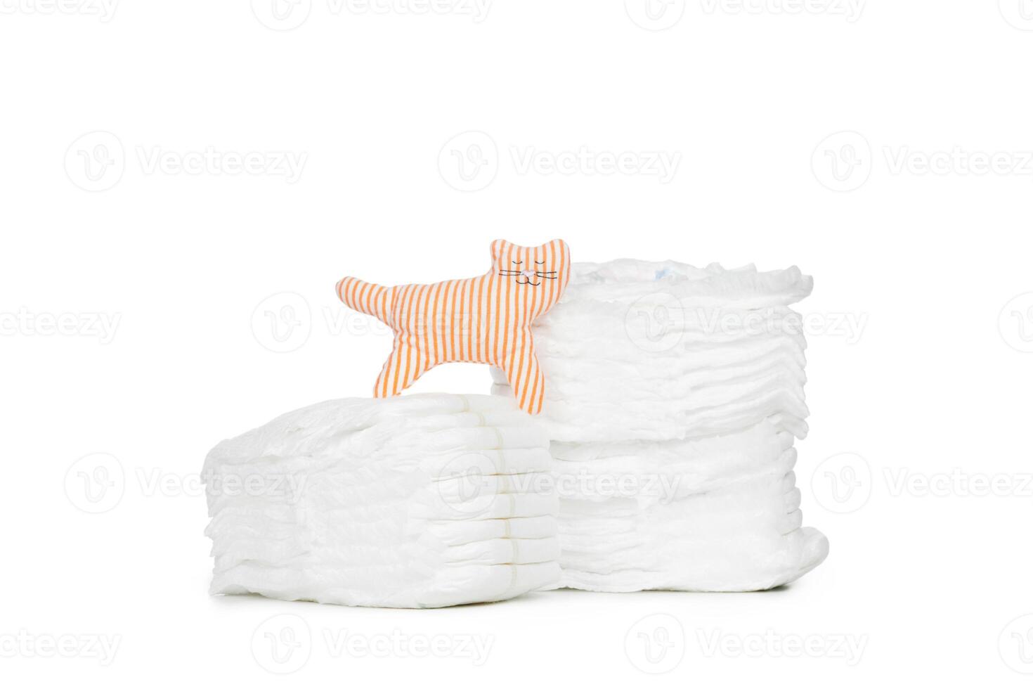 Stack of diapers isolated on white background photo
