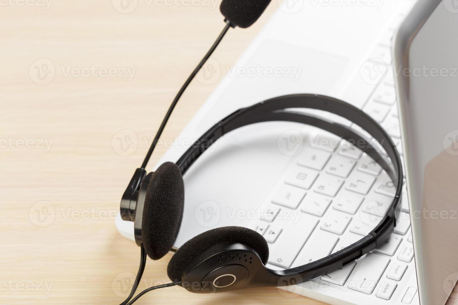 headset on keyboard computer laptop photo