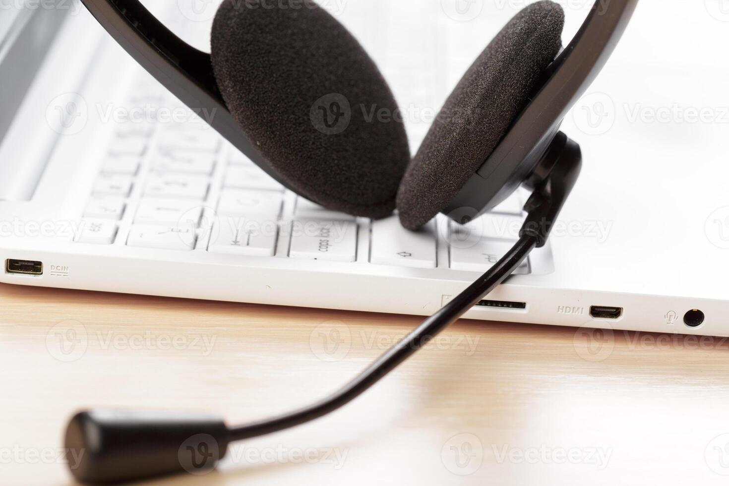 headset on keyboard computer laptop photo