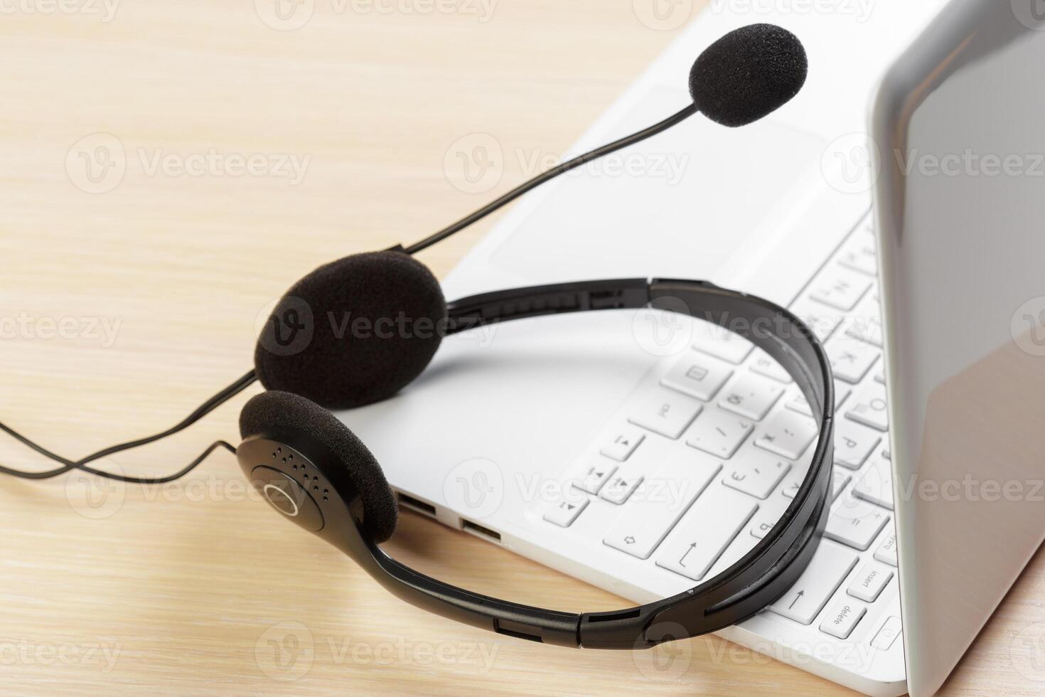 headset on keyboard computer laptop photo