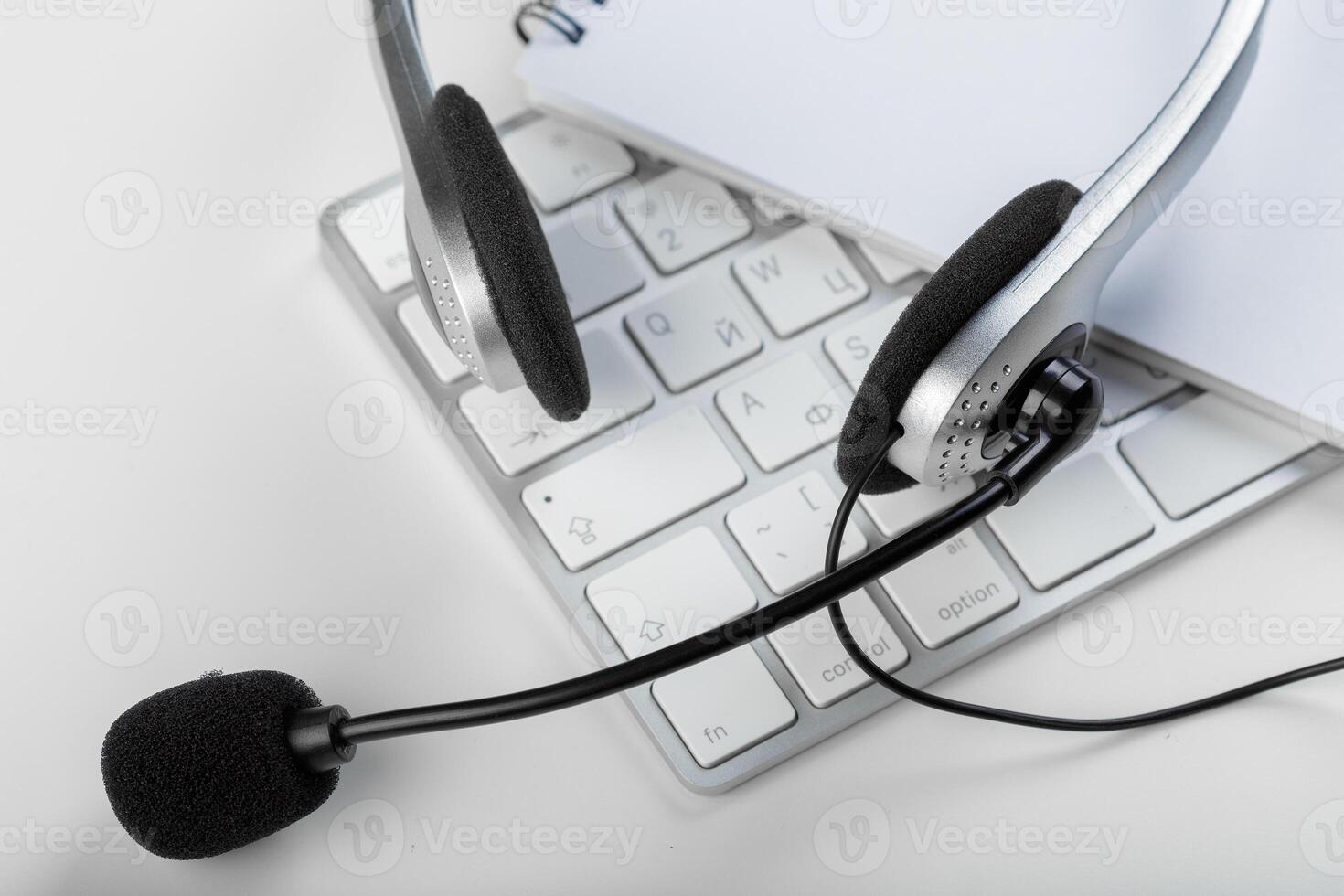 headset on keyboard computer laptop photo