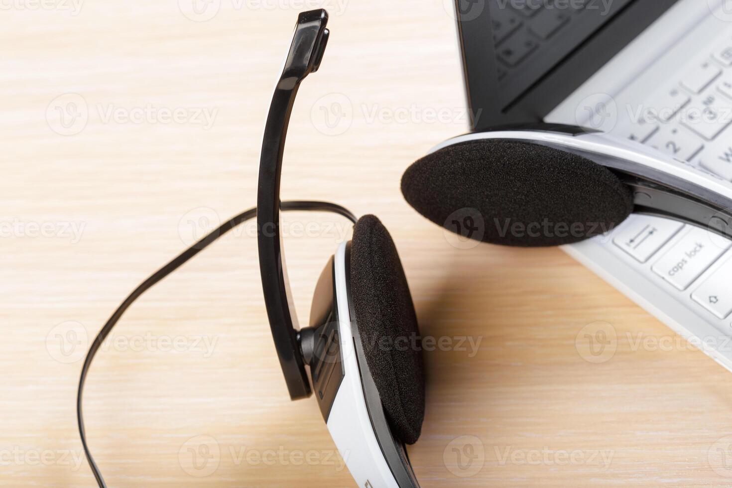 headset on keyboard computer laptop photo
