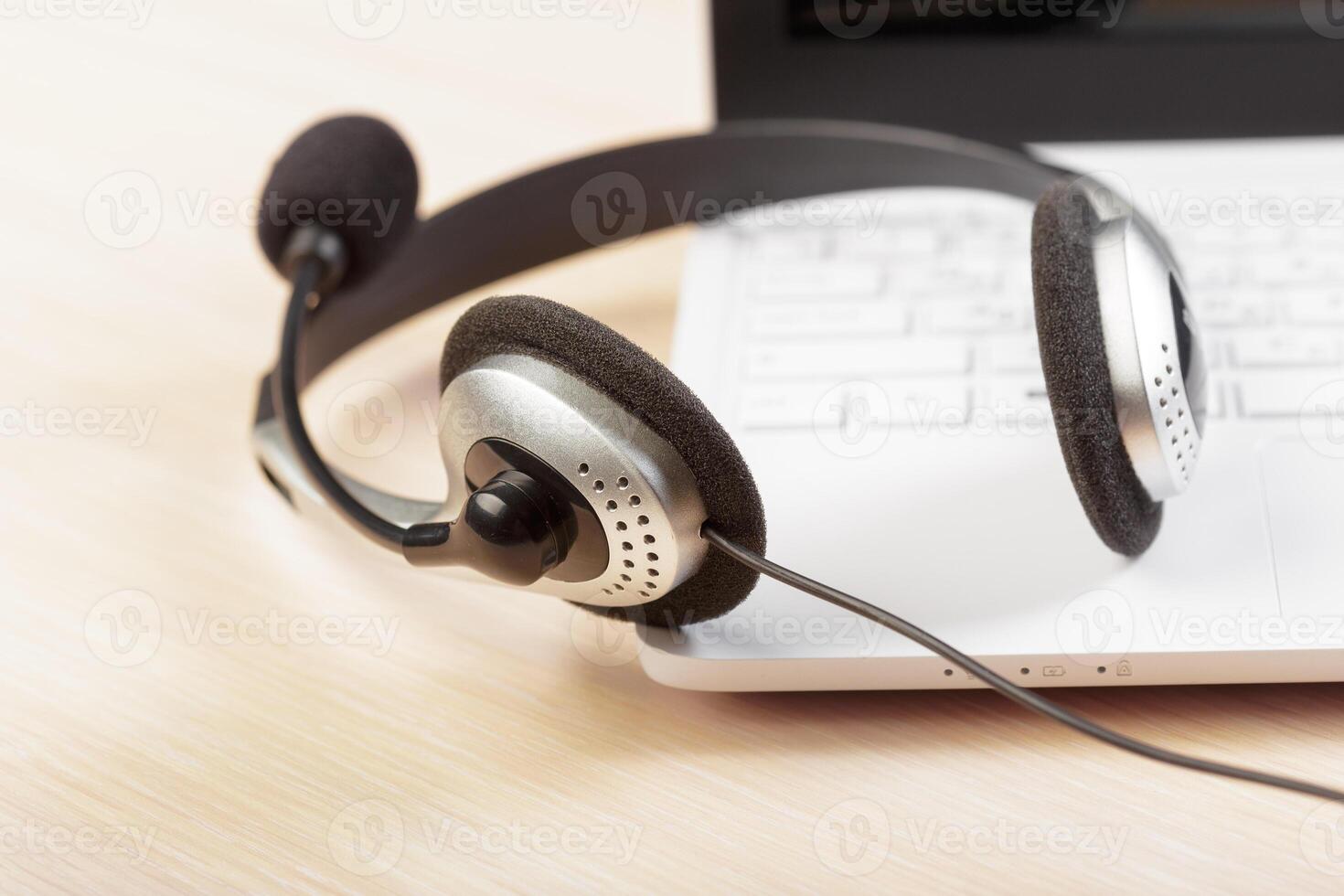 headset on keyboard computer laptop photo