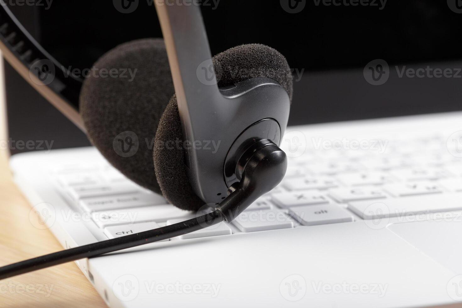 headset on keyboard computer laptop photo