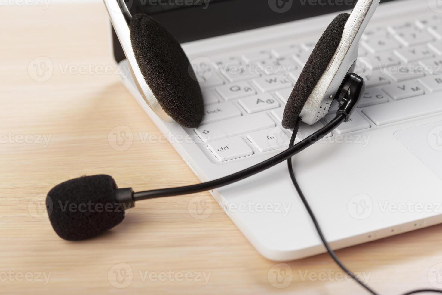 headset on keyboard computer laptop photo
