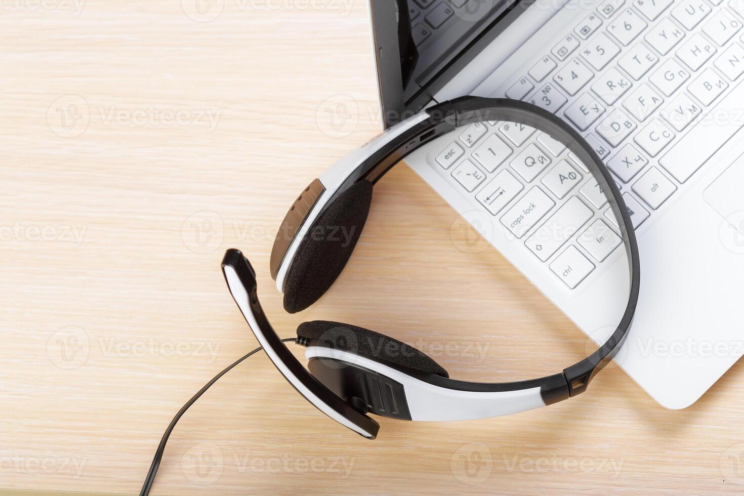 headset on keyboard computer laptop photo