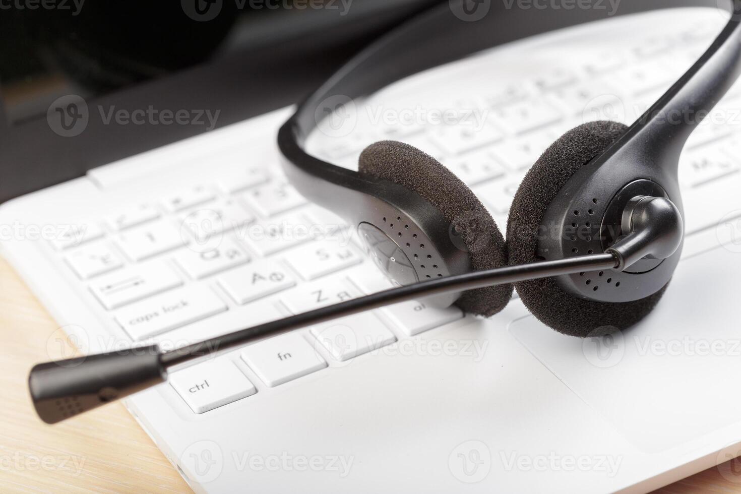 headset on keyboard computer laptop photo