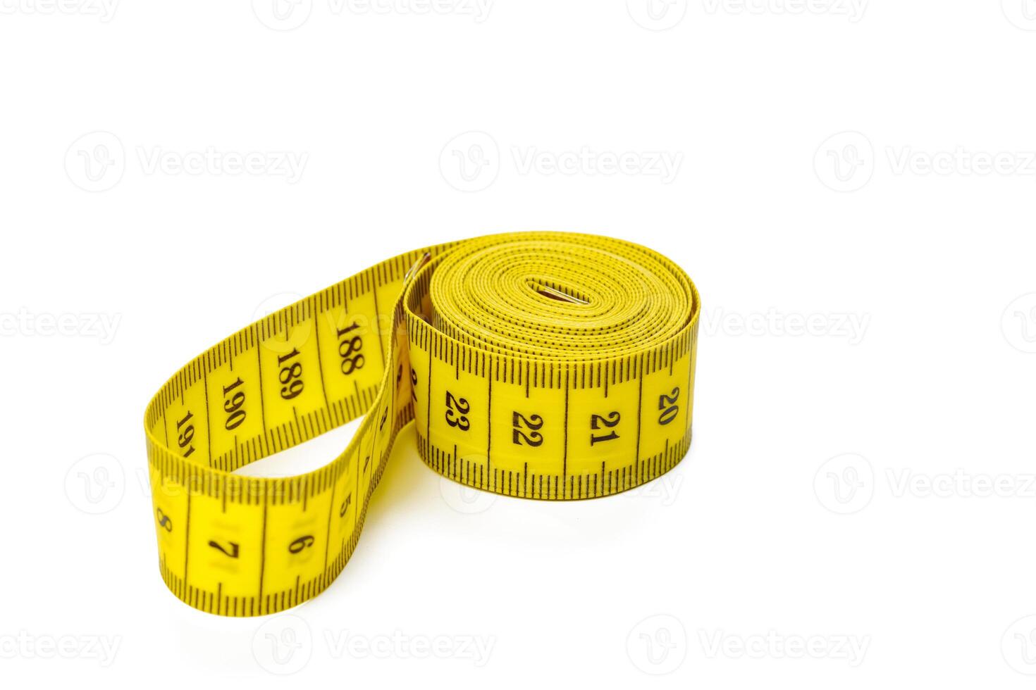 yellow metric measuring tape isolated on white panorama background photo