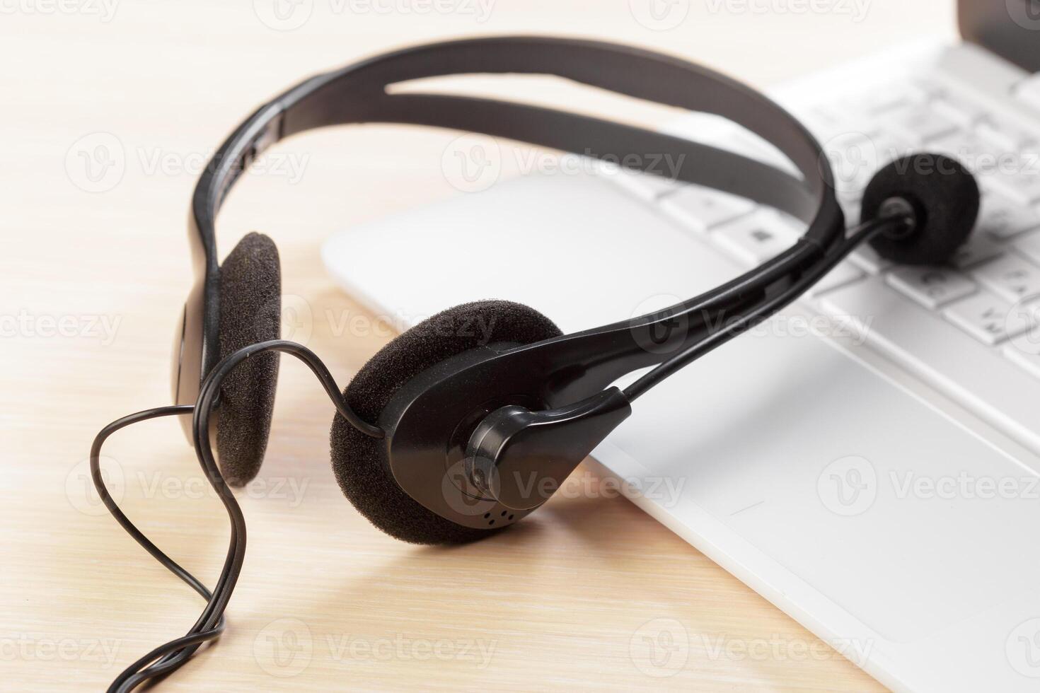 headset on keyboard computer laptop photo