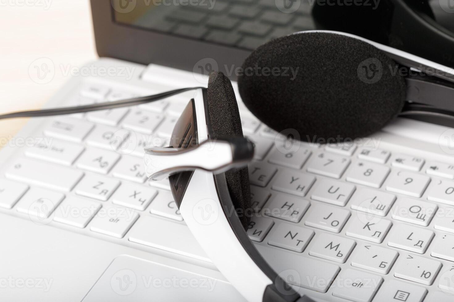 headset on keyboard computer laptop photo
