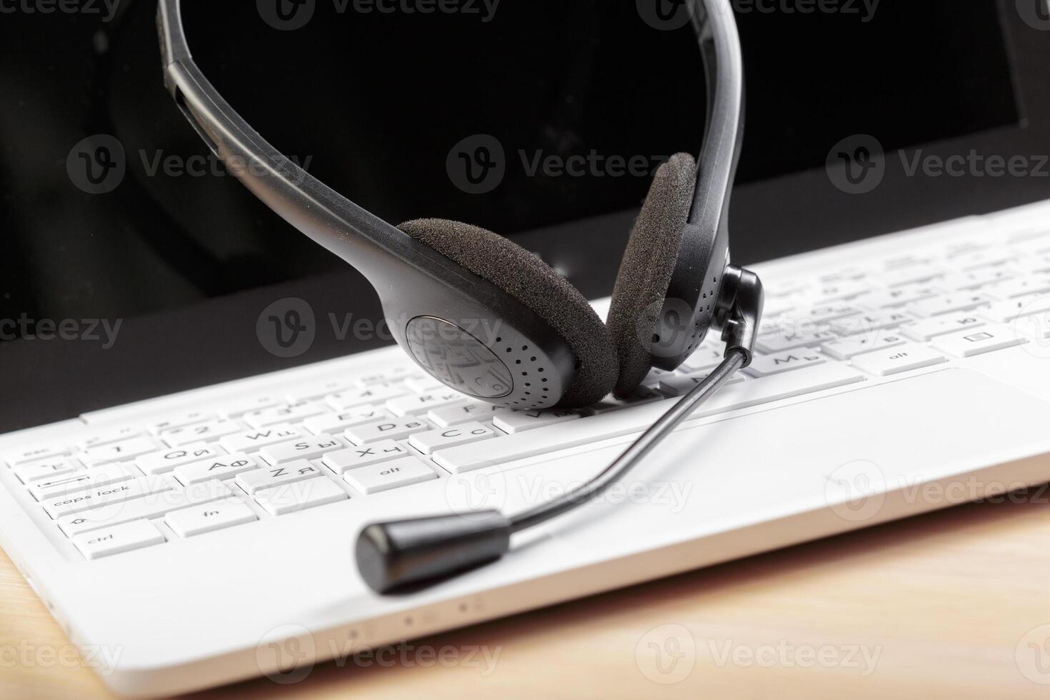 headset on keyboard computer laptop photo