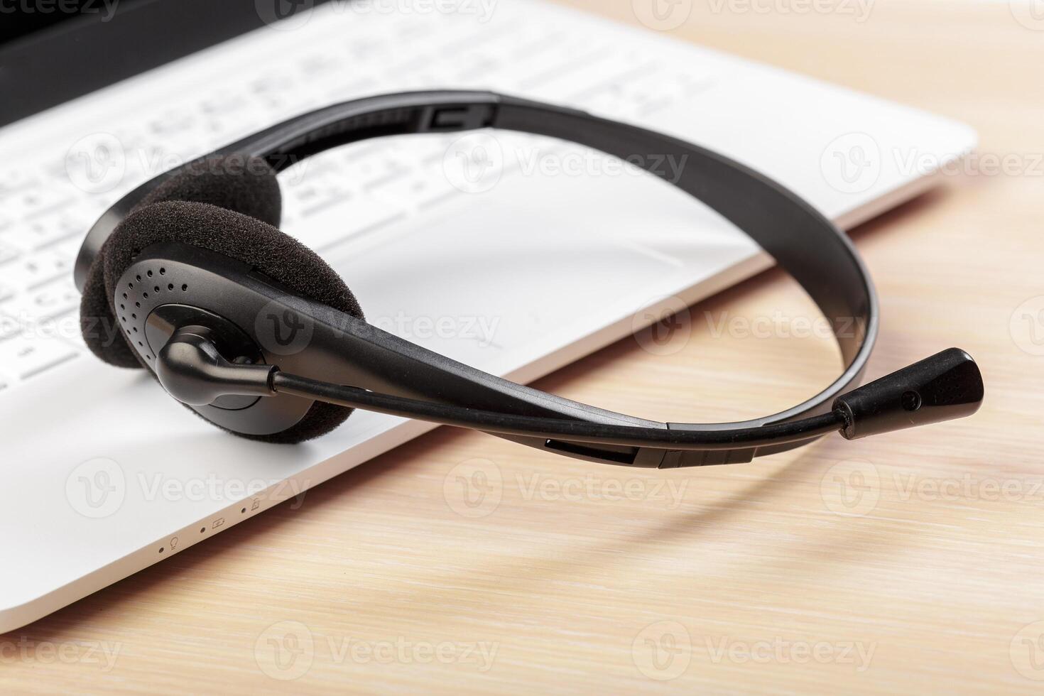 headset on keyboard computer laptop photo