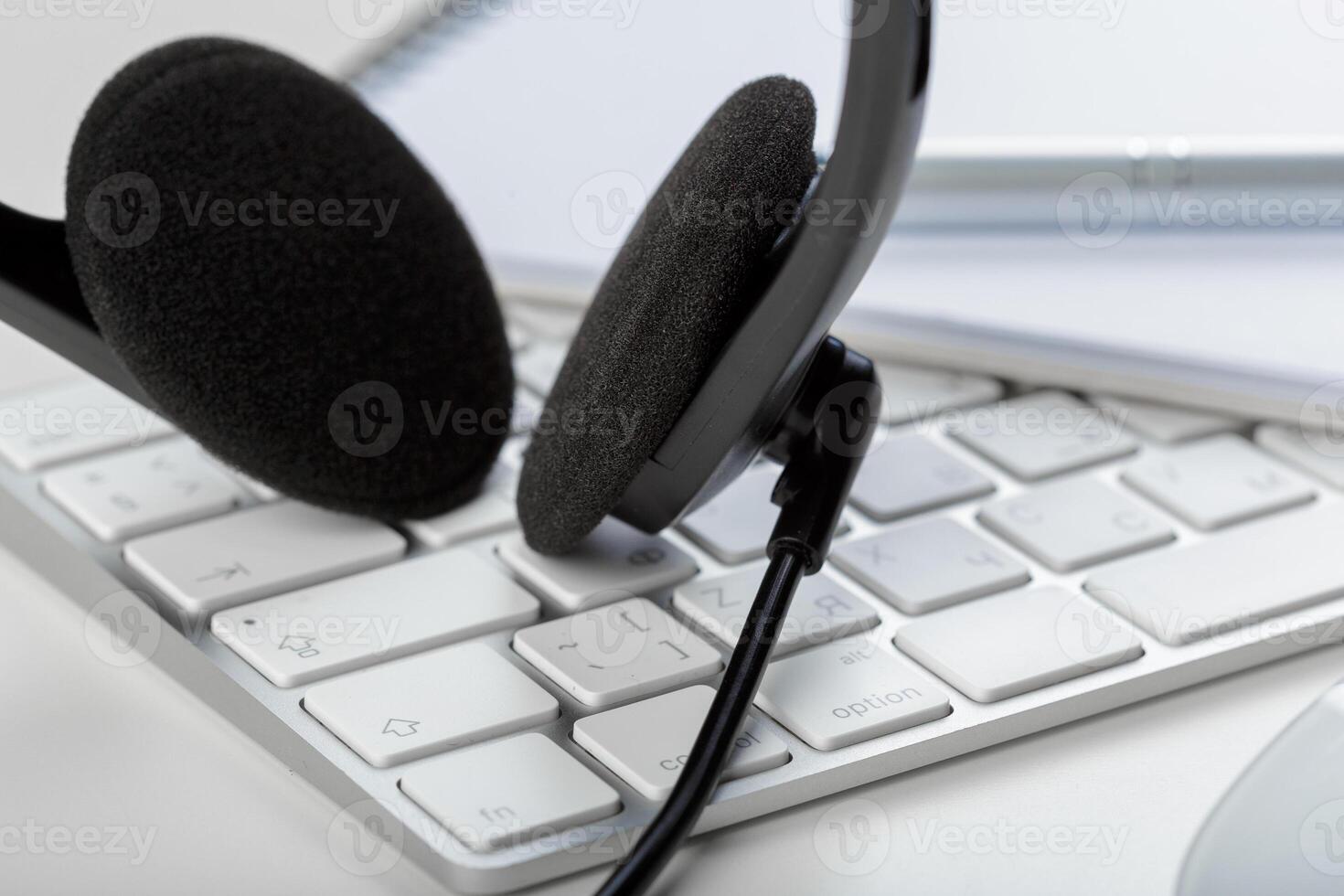 headset on keyboard computer laptop photo