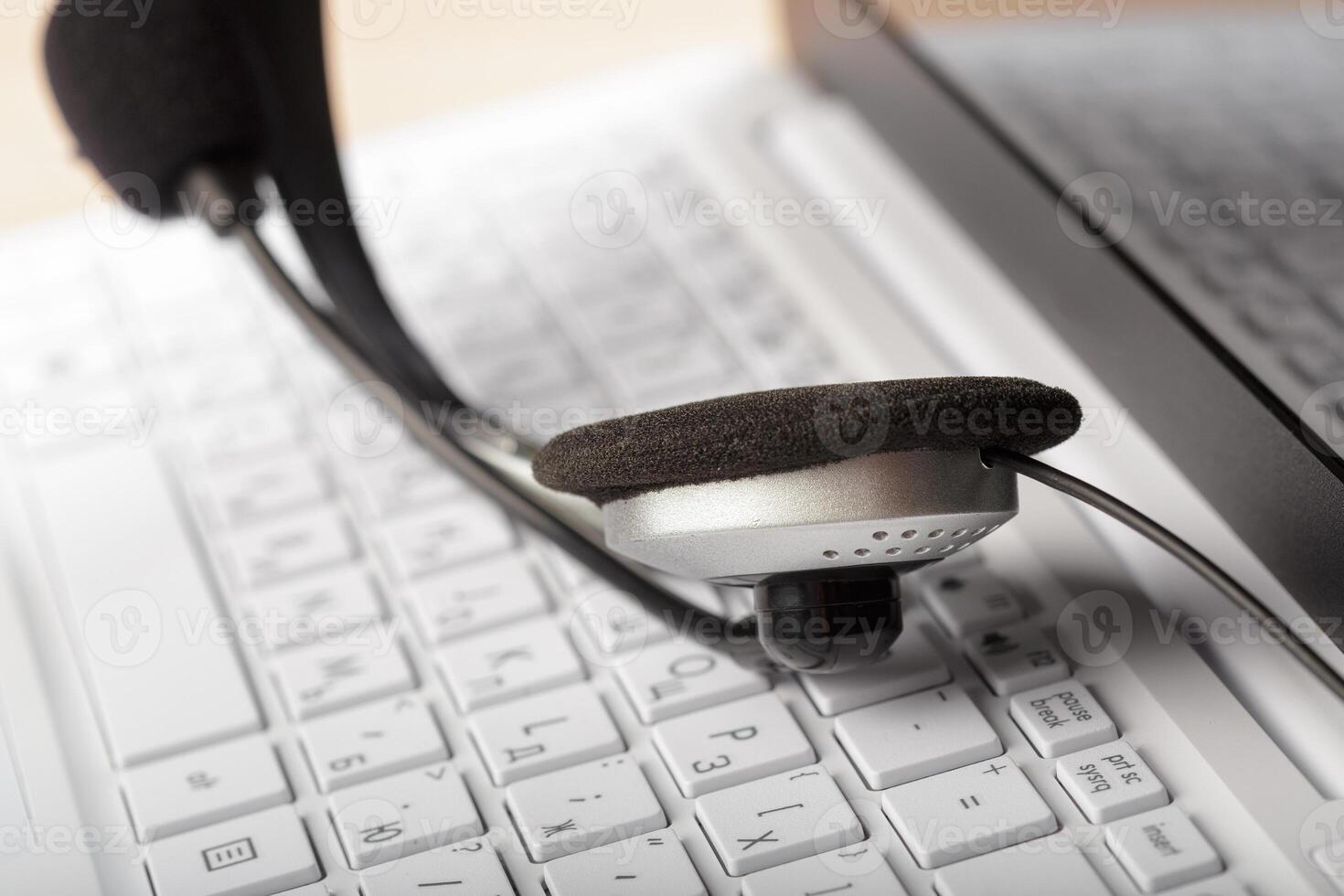 headset on keyboard computer laptop photo
