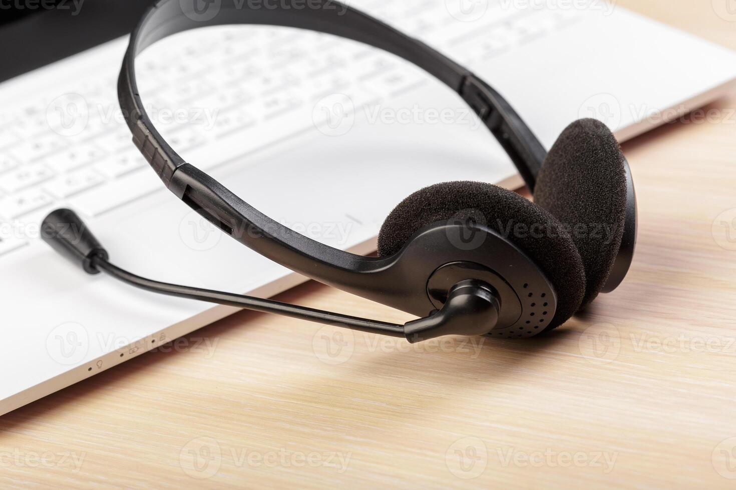 headset on keyboard computer laptop photo