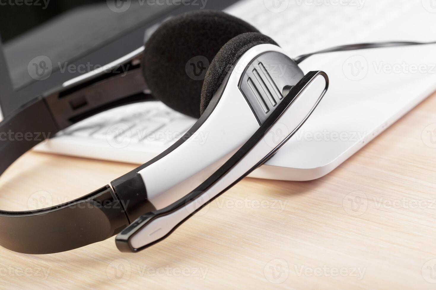 headset on keyboard computer laptop photo