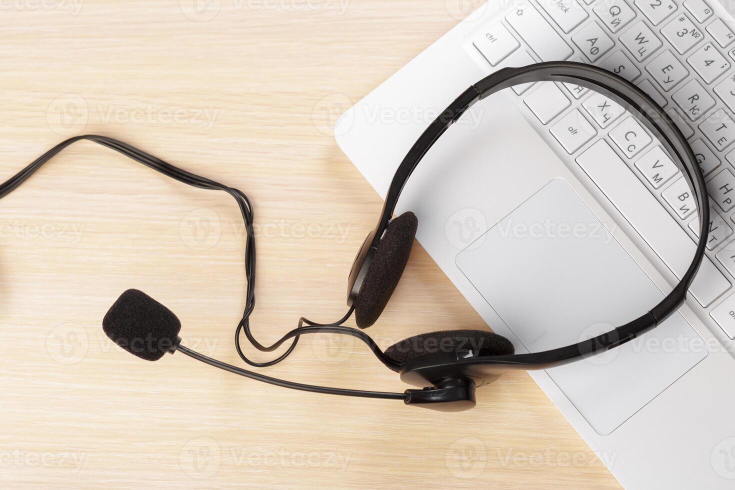 headset on keyboard computer laptop photo