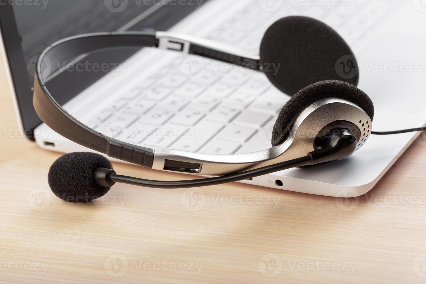 headset on keyboard computer laptop photo