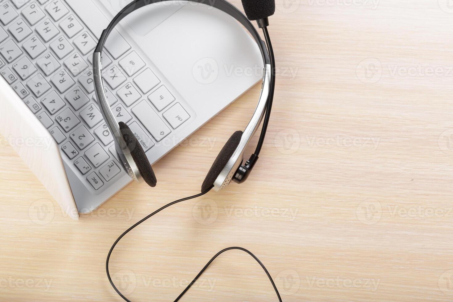 headset on keyboard computer laptop photo